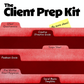 Red file folder with labeled tabs on a white background, featuring text 'The Client Prep Kit'.